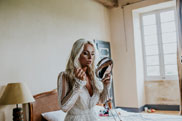 Bride looking in the mirror