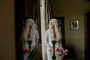 Bride looking out of window