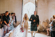 Bride walking down the aisle with Father