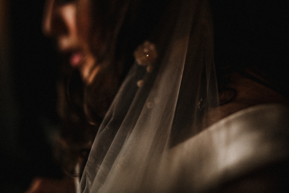 bride putting veil in in at the malmaison hotel 