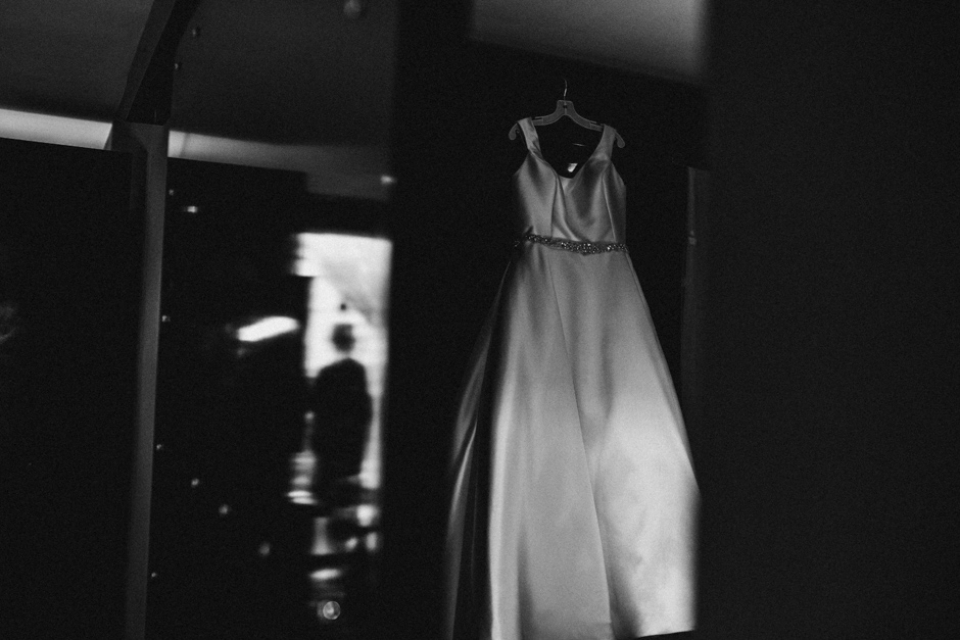 brides dress hanging on wardrobe at the malmaison hotel , liverpool