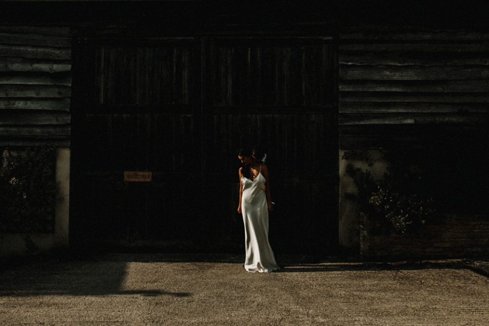 creative portrait with modern bride in the row wedding dress at Merris court wedding venue