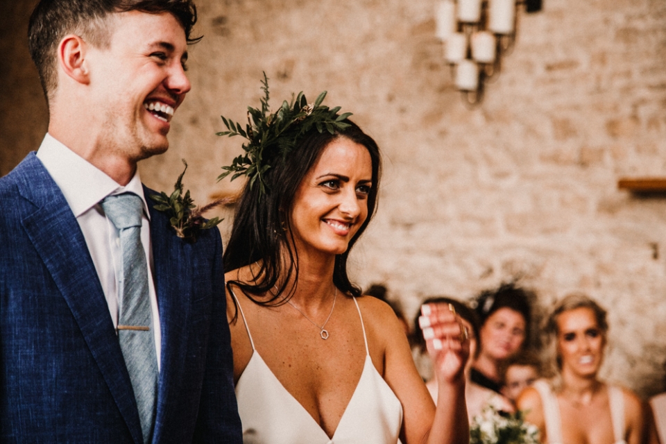 bride and groom during wedding ceremony at Merris court stone barn