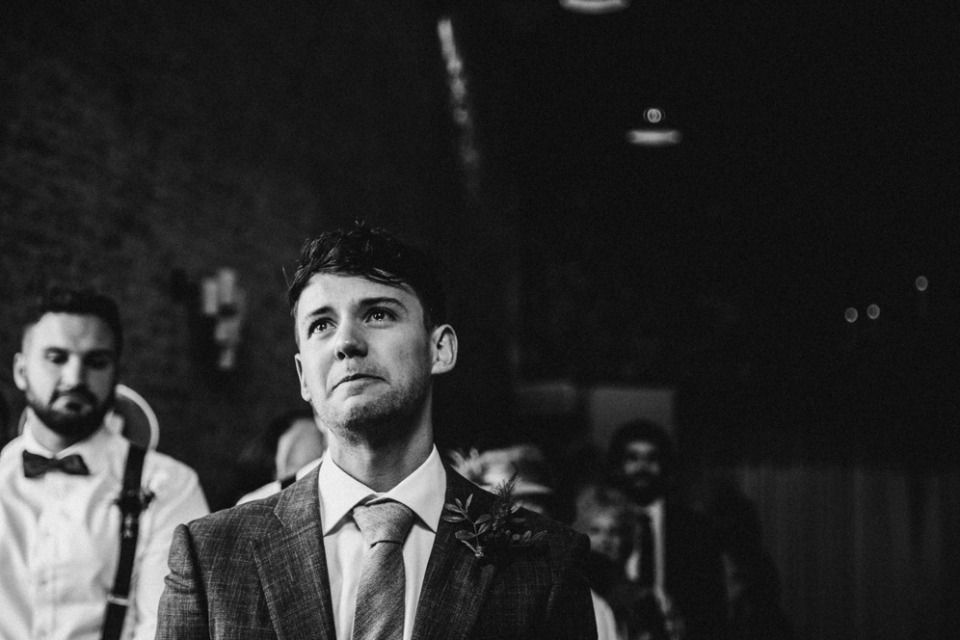 groom becoming emotional prior to wedding ceremony
