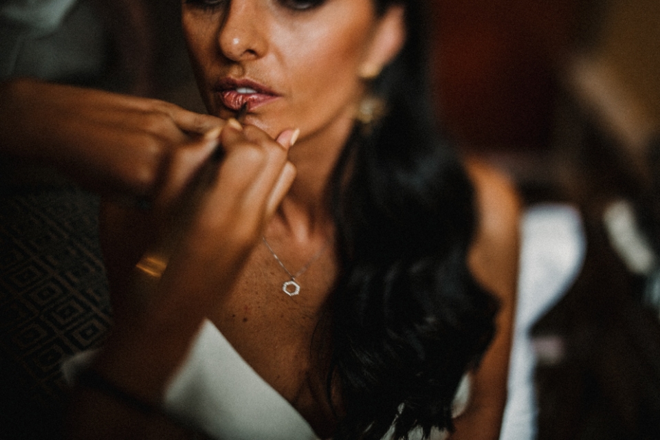 bride having her makeup done in Woodstock wedding