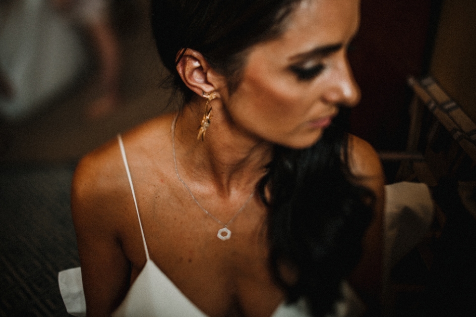 bride having her lipstick applied , london wedding 