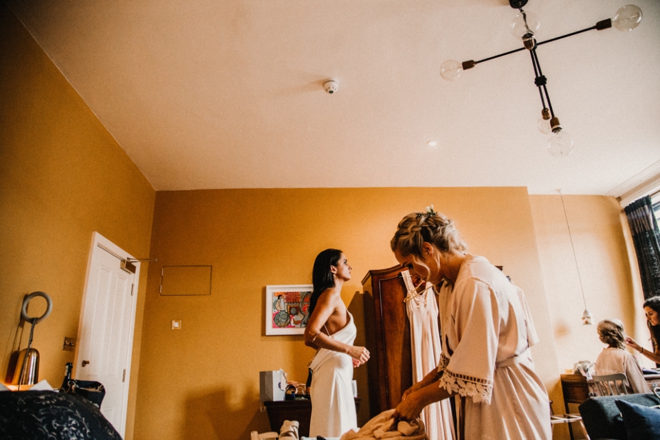 bride and her bridesmaids during bridal prep at Merris court wedding venue