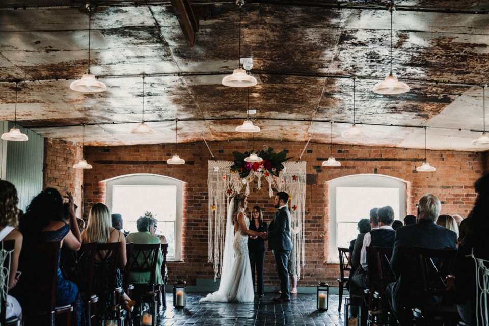 ceremony , bride and groom exchanging wedding vows , west mill wedding venue