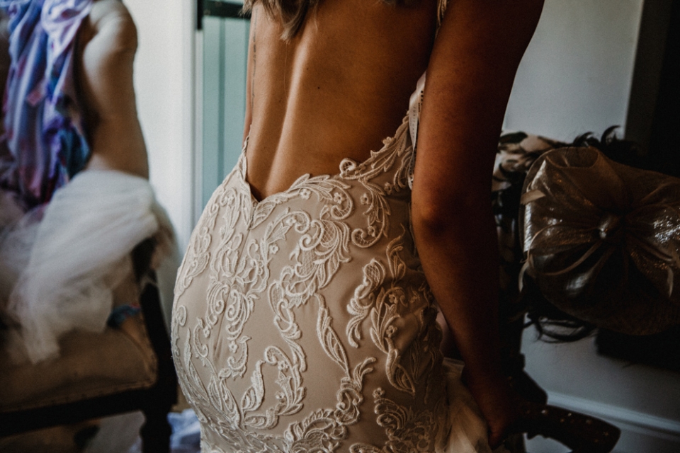 close up detail od brides wedding dress