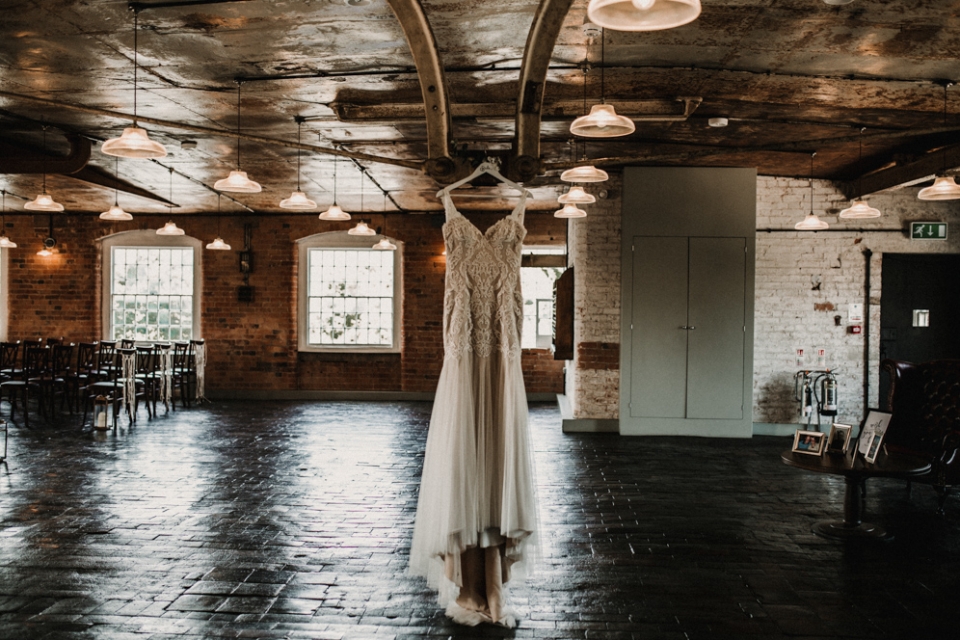 bridal gown hanging at the west mill