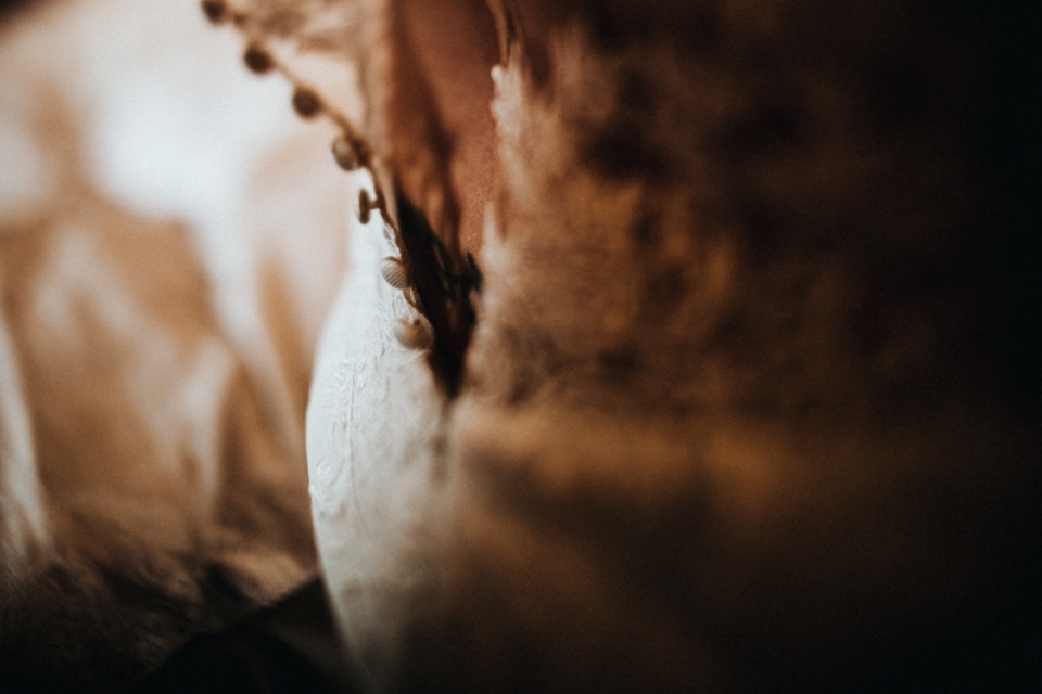 close up dress details at manchester wedding , bridal prep