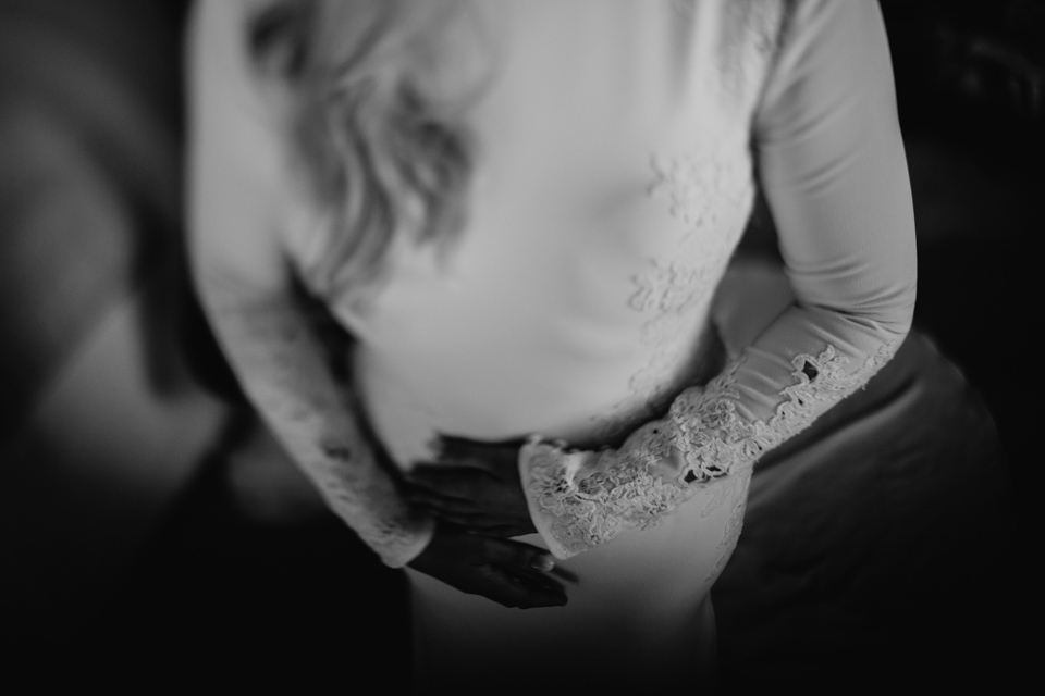 black and white close up of bride in her pronovias wedding gown