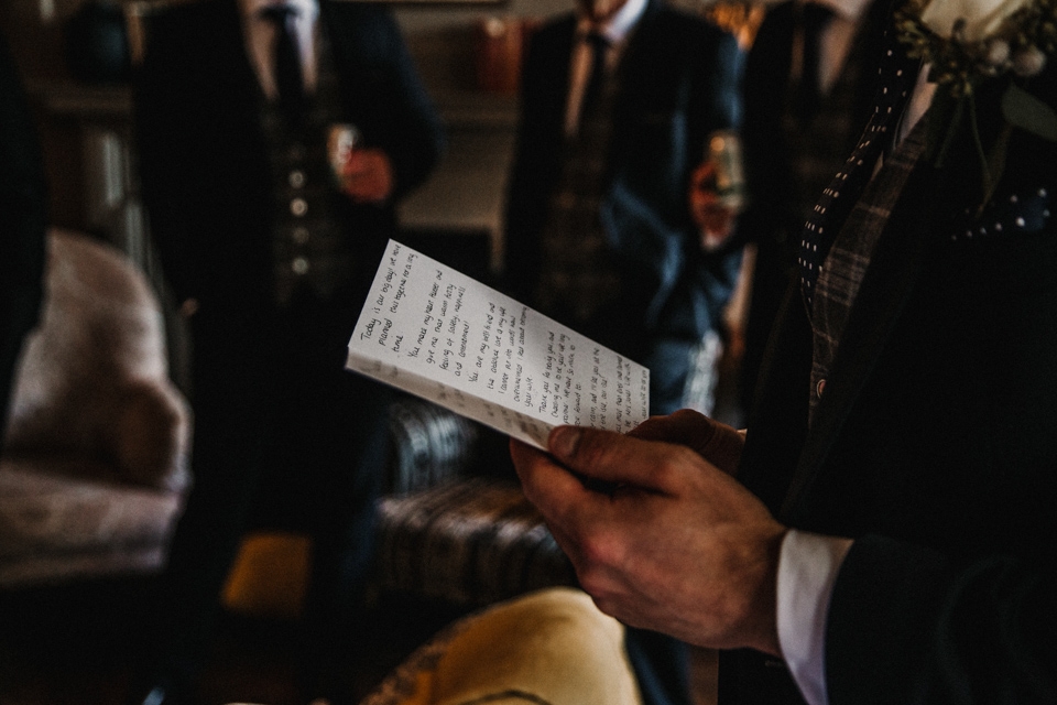 groom reading brides letter