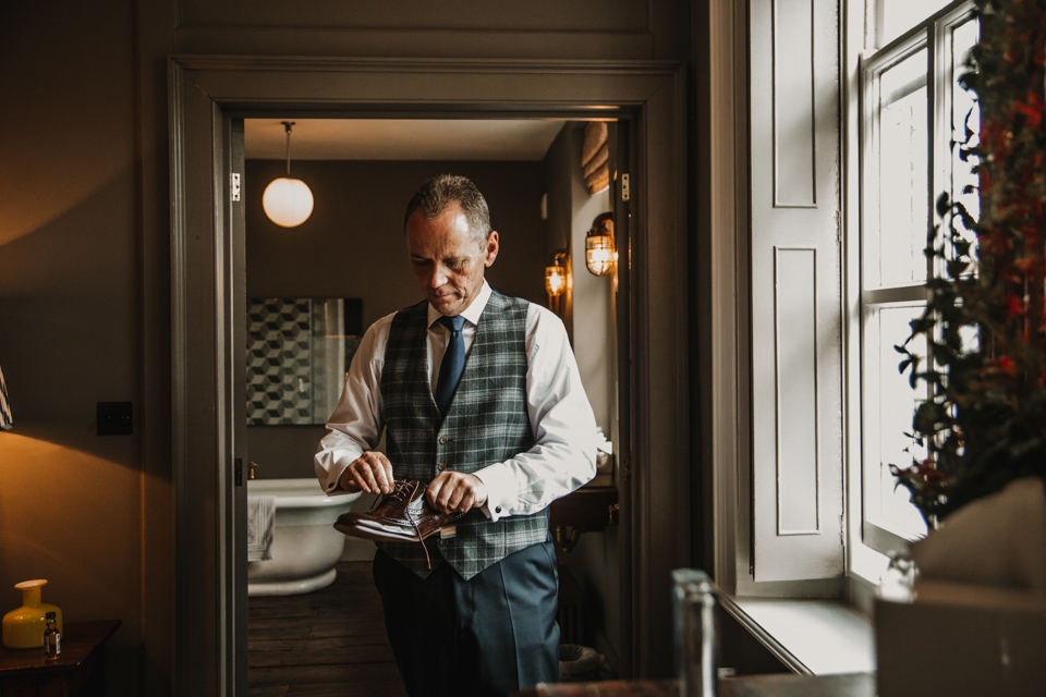 father of bride getting ready 