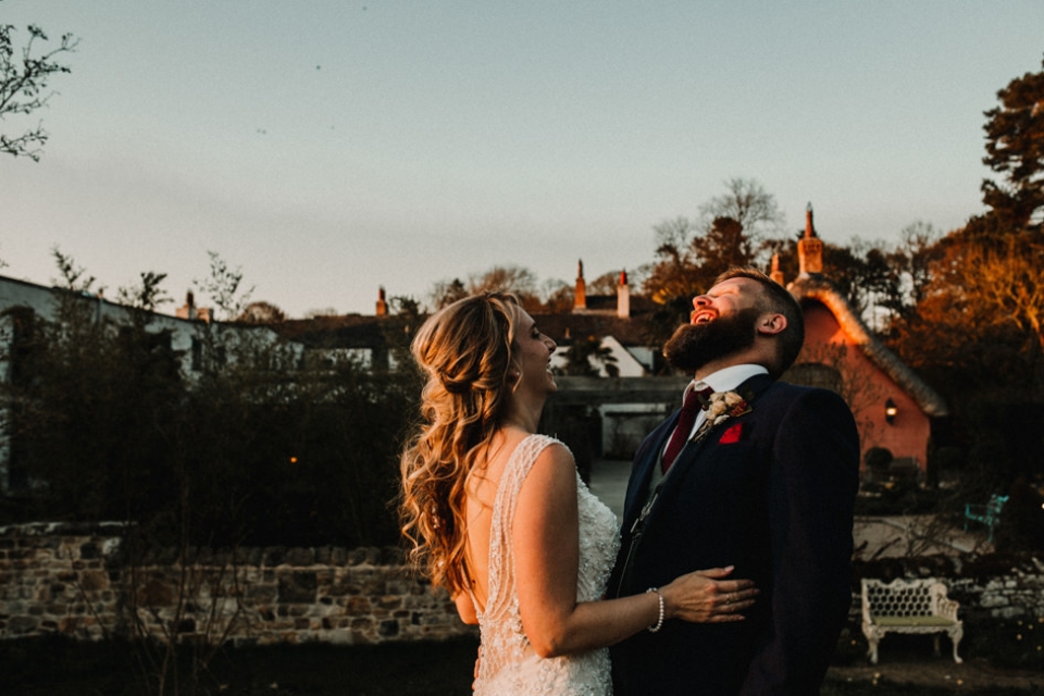 husband and wife on golden hour portrait shoot at le petit chateau