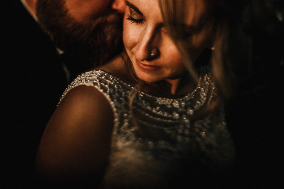 creative intimate portrait of brie and groom during golden hour