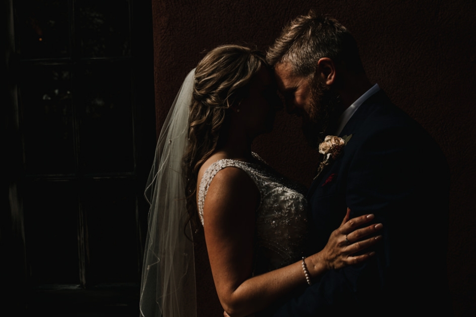 close up of couple out side le petit chateau chapel