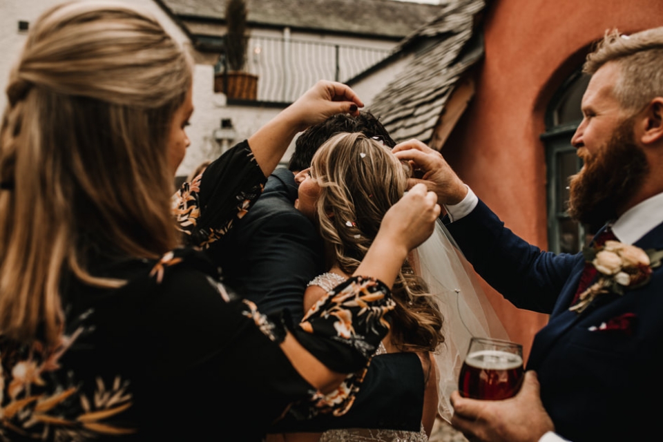 guests congratulating bride and groom at wedding reception