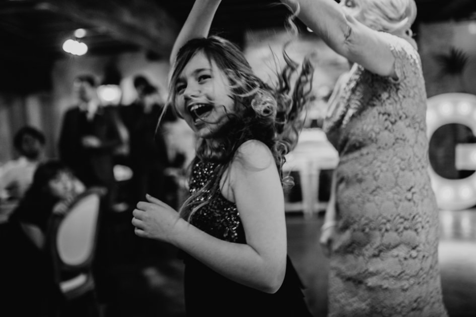 flower girl dancing at the first dance on scotland wedding 