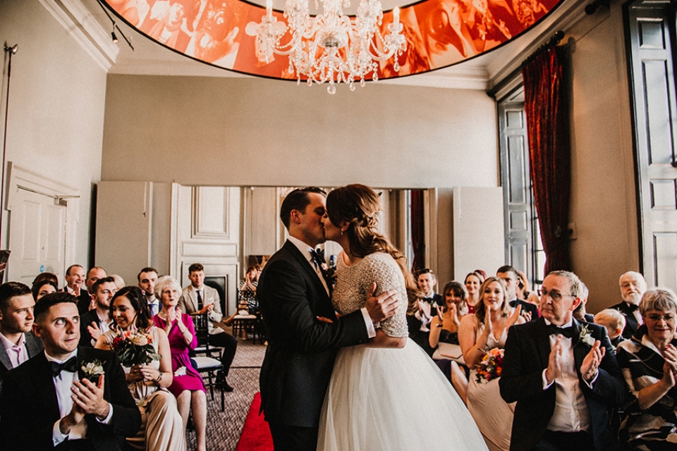 bride and groom first kiss 