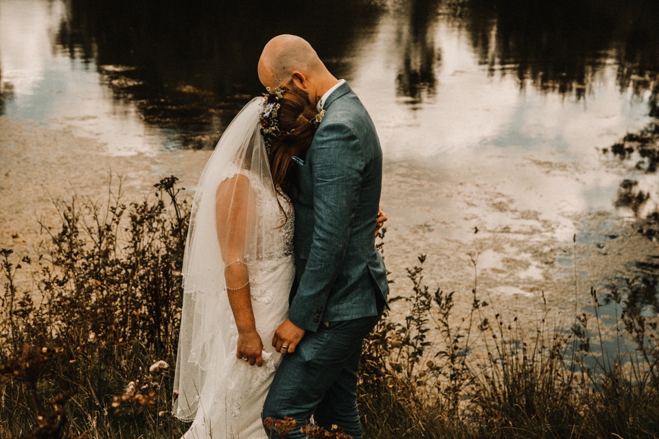 couple enjoying some intimate moments together on their wedding day buckland house