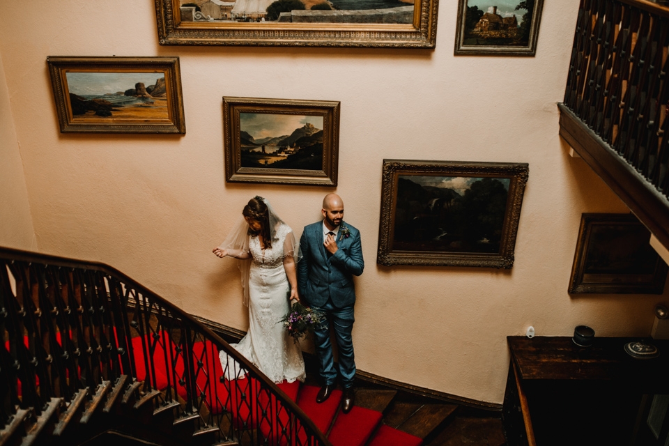 beautiful staircase bride and groom portraits 