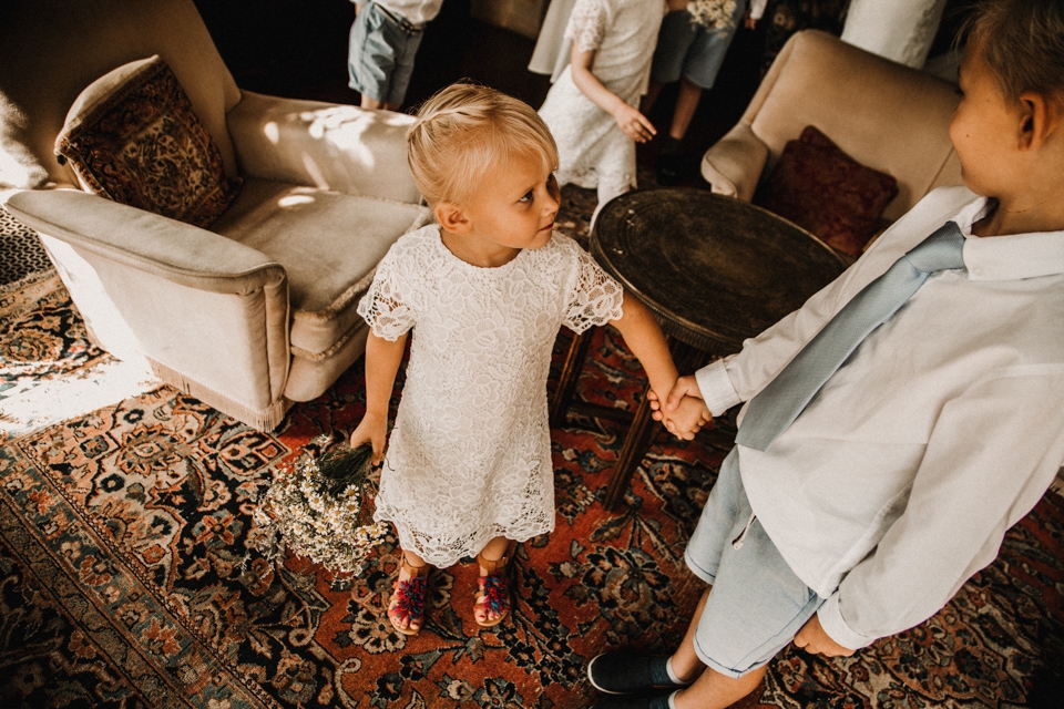 flower girl and page boy getting ready to walk down the aisle