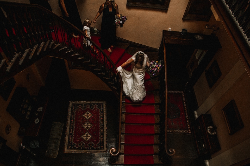 bride walking to the ceremony in devon wedding venue