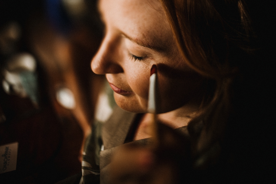 bride having her hair and makeup done