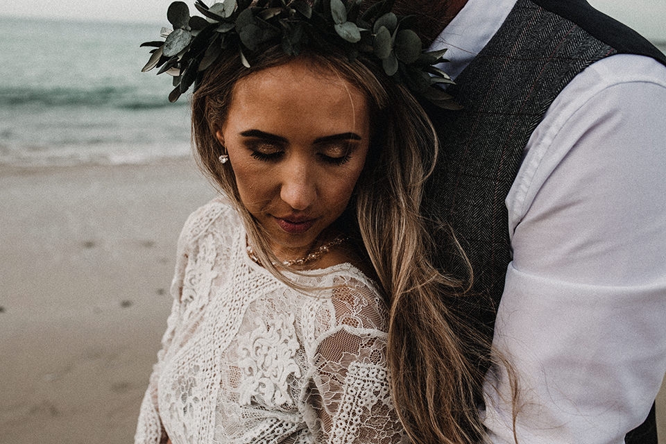 grace loves lace wedding gown in bridal portrait , cornwall