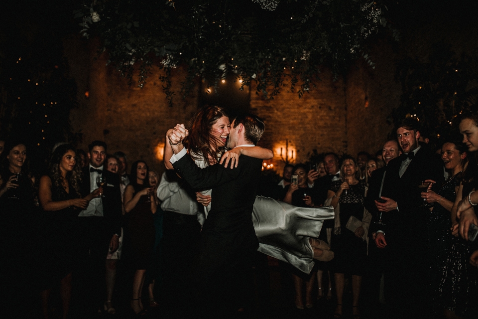 bride and groom dancing at cripps barn cotswolds