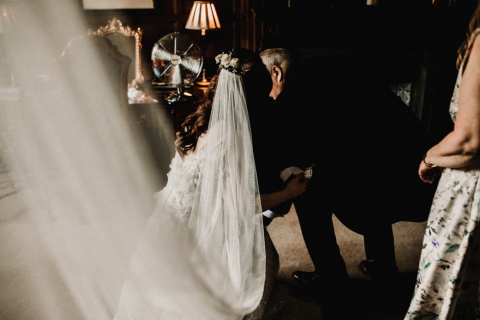 bride getting ready during bridal preparation 