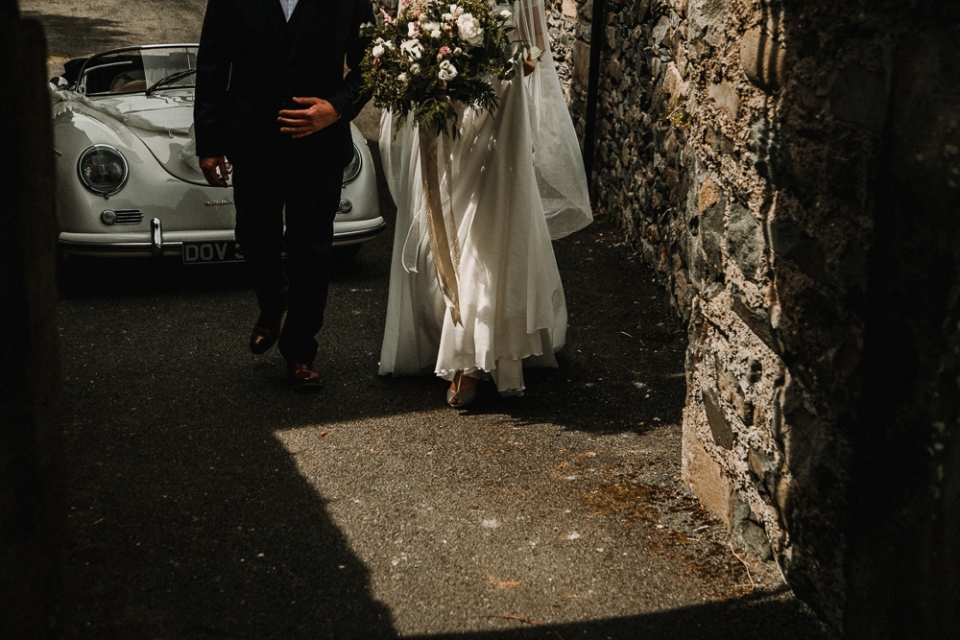 bride and father of the bride walking to the ceremony