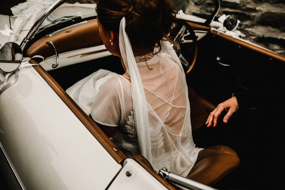 bride getting out of her wedding car