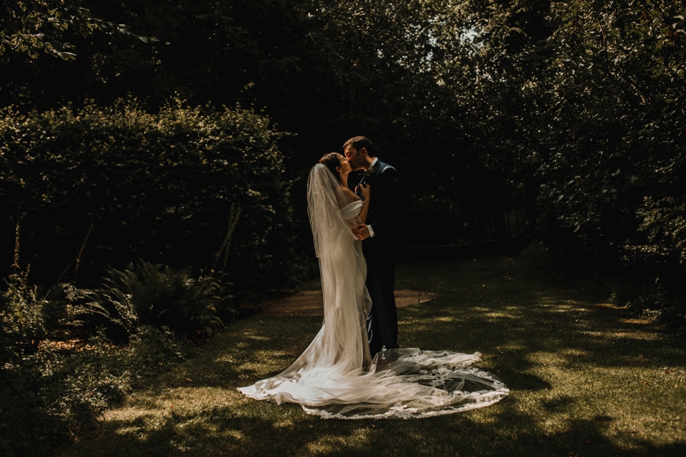 couple portraits in the garden at cripps barn wedding venue