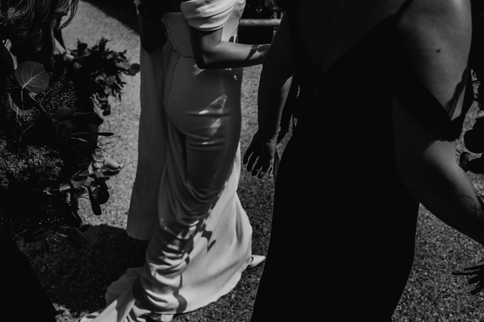 bride walking with her bridesmaids from the ceremony to reception