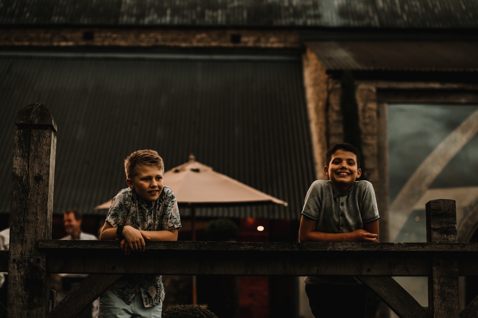 boys having fun with smores at cripps barn