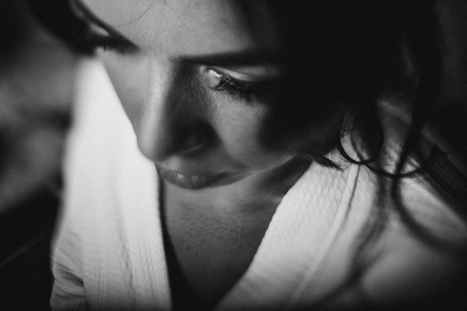 black and white close up portrait of brides during wedding preparation