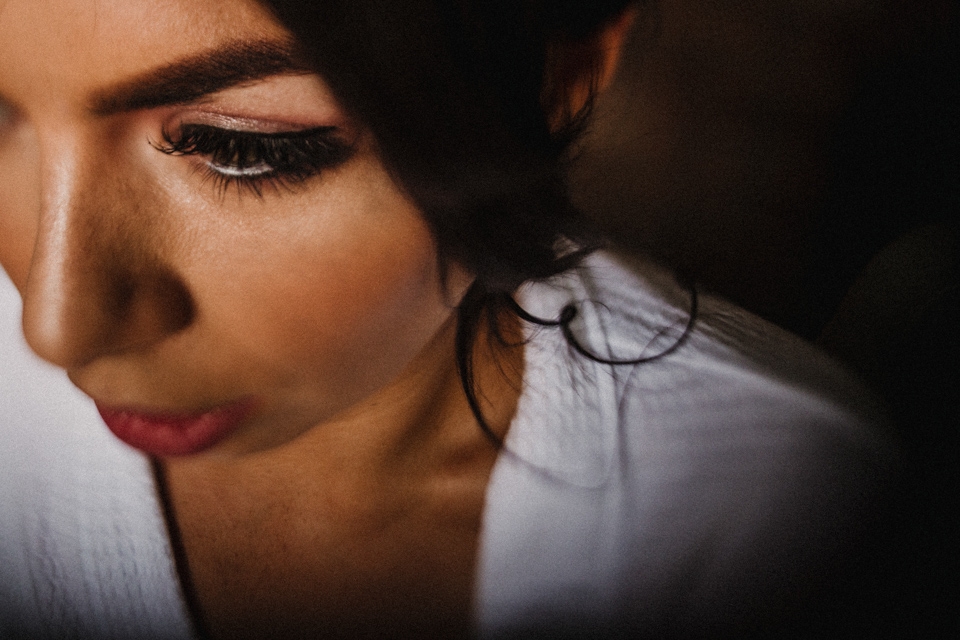 bride having her makeup touched up 