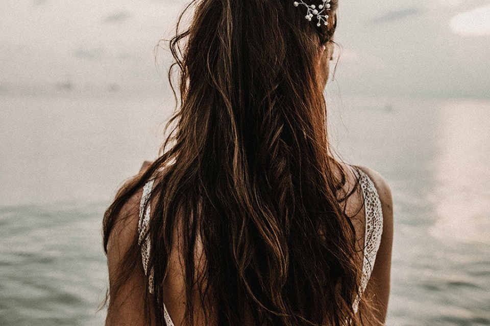 boho hair and bride on the beach