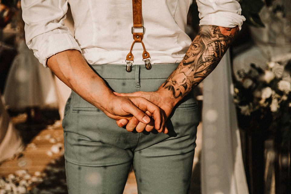 groom waiting for his bride to walk down the aisle