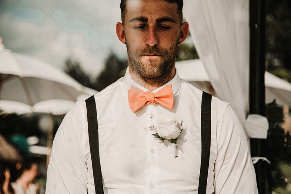 groom is nervous waiting for his wife to be to arrive