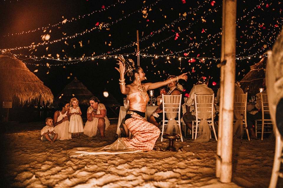 thai girl dancing in beautiful thai costume on beach