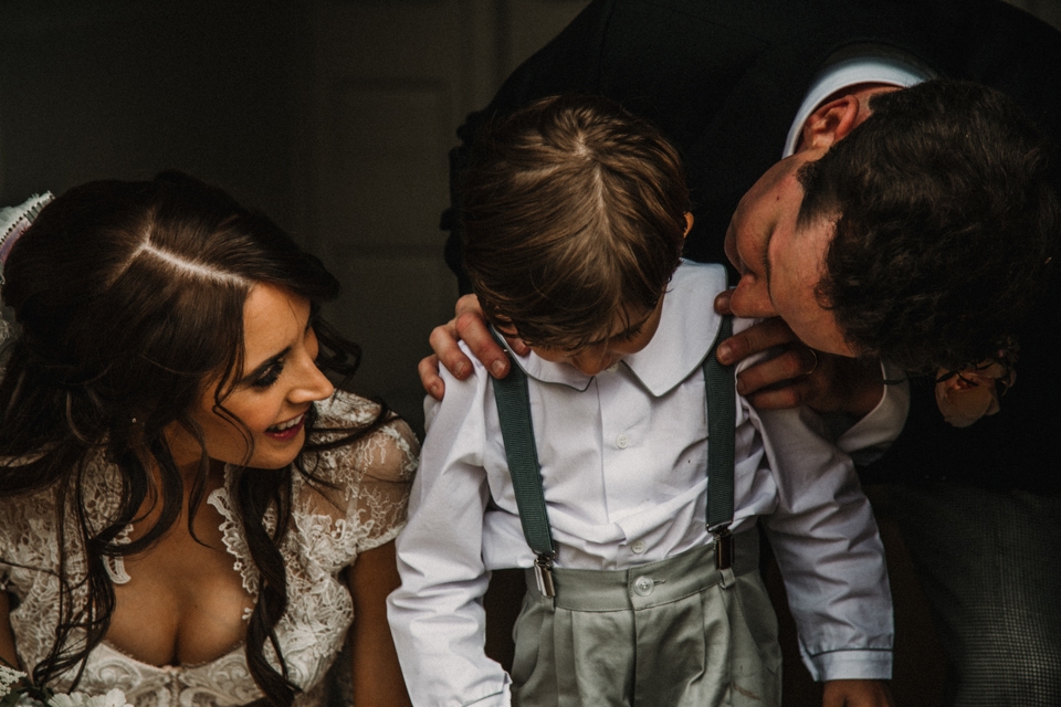 bride and groom with page boy at talbot hotel , yorkersgate