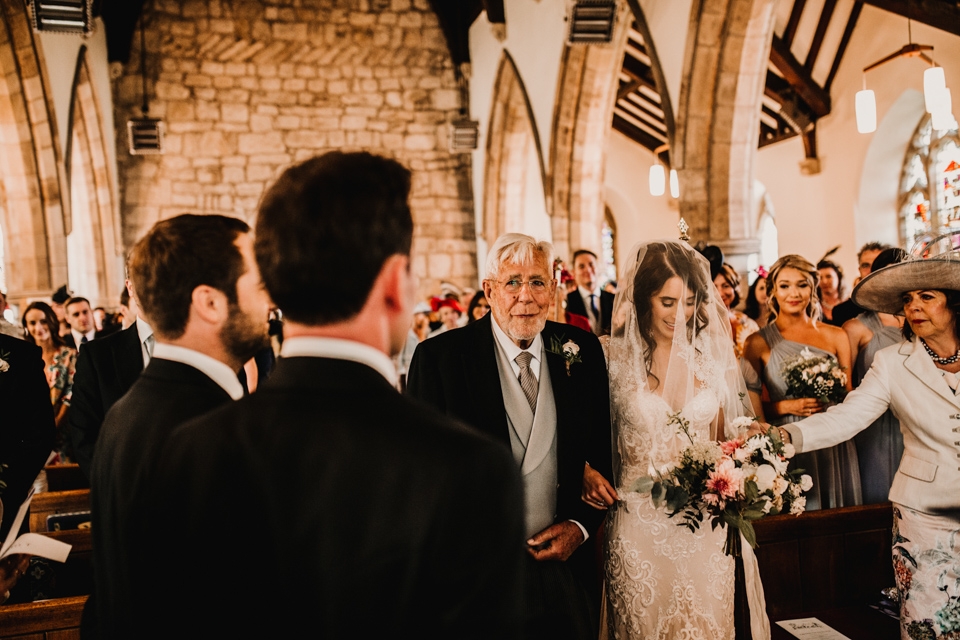 Bride and grandfather walking down the aisle , york wedding photography