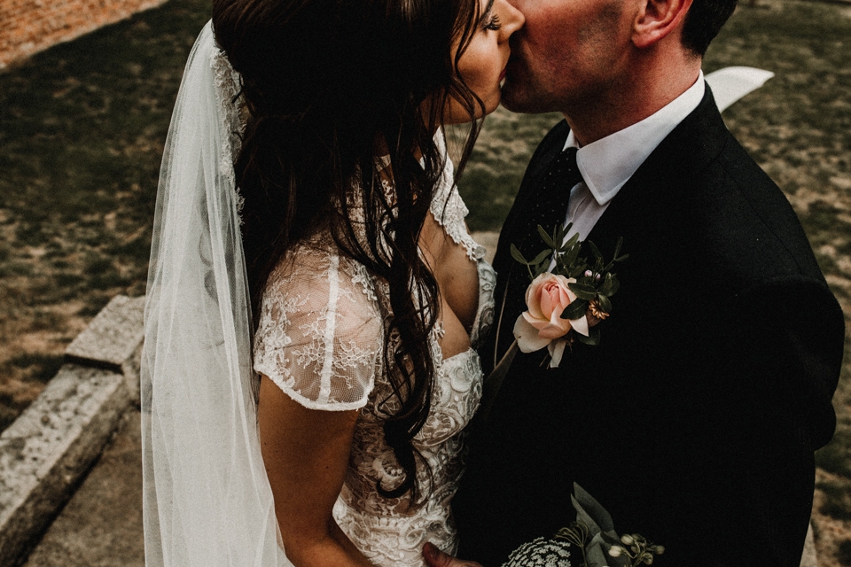 bride and groom enjoying kissing on their wedding day