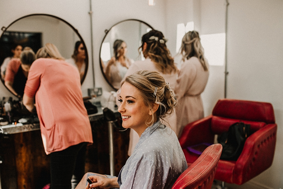 bride having make up done by sarah meredith