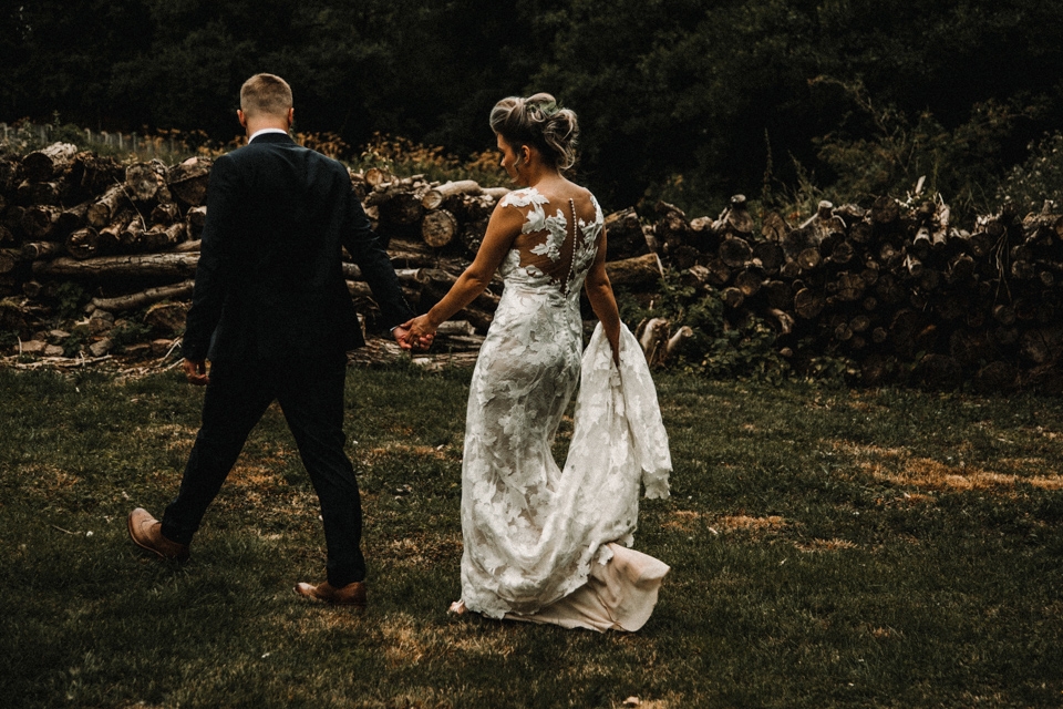 couple having a few moments walking hand in hand together