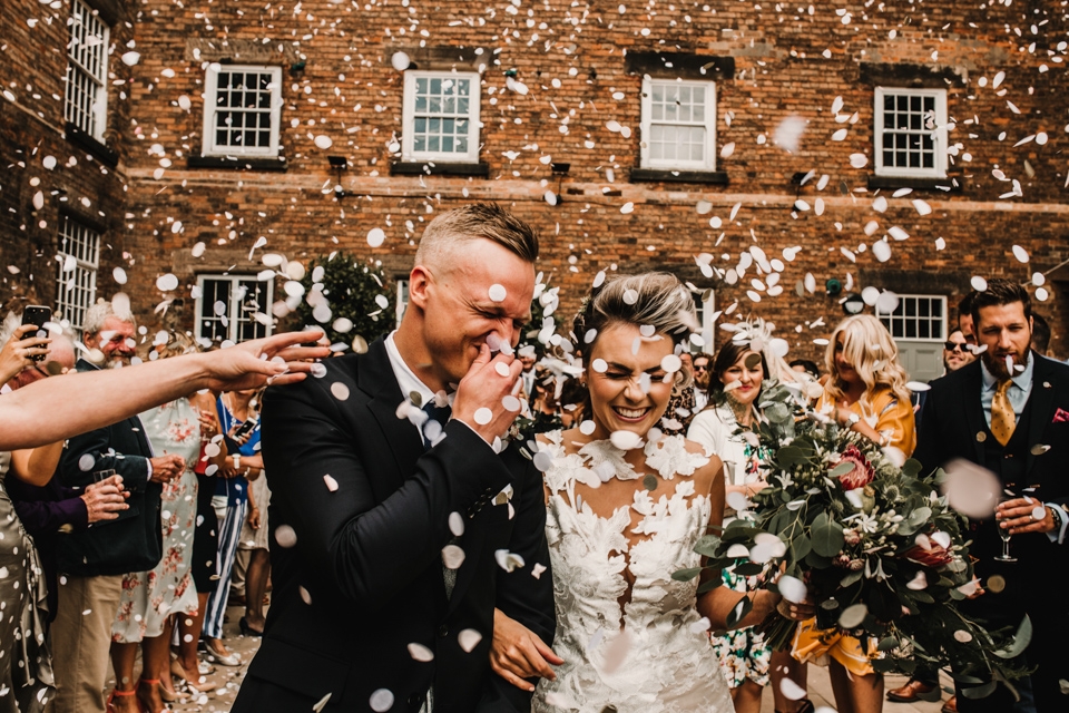 so much confetti at the west mill wedding venue