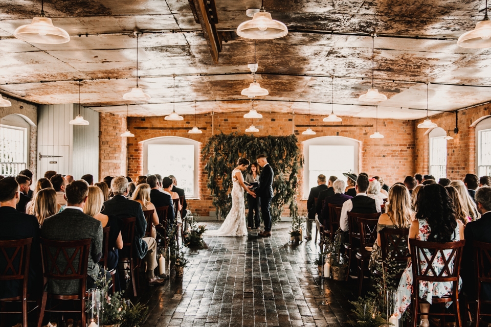 bride and groom ceremonial vows at west mill derby